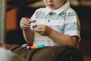 Little boy playing with blocks