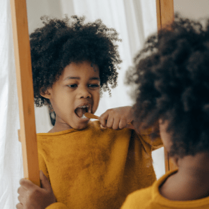 unnamed (6) - The Autism Therapy Group - ABA Therapy young girl brushing her teeth