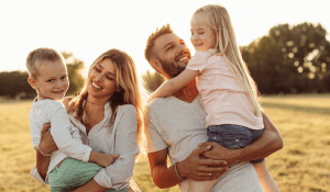 parents holding children