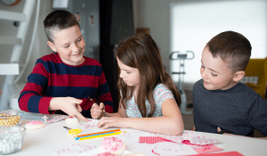 kids doing valentine's day crafts