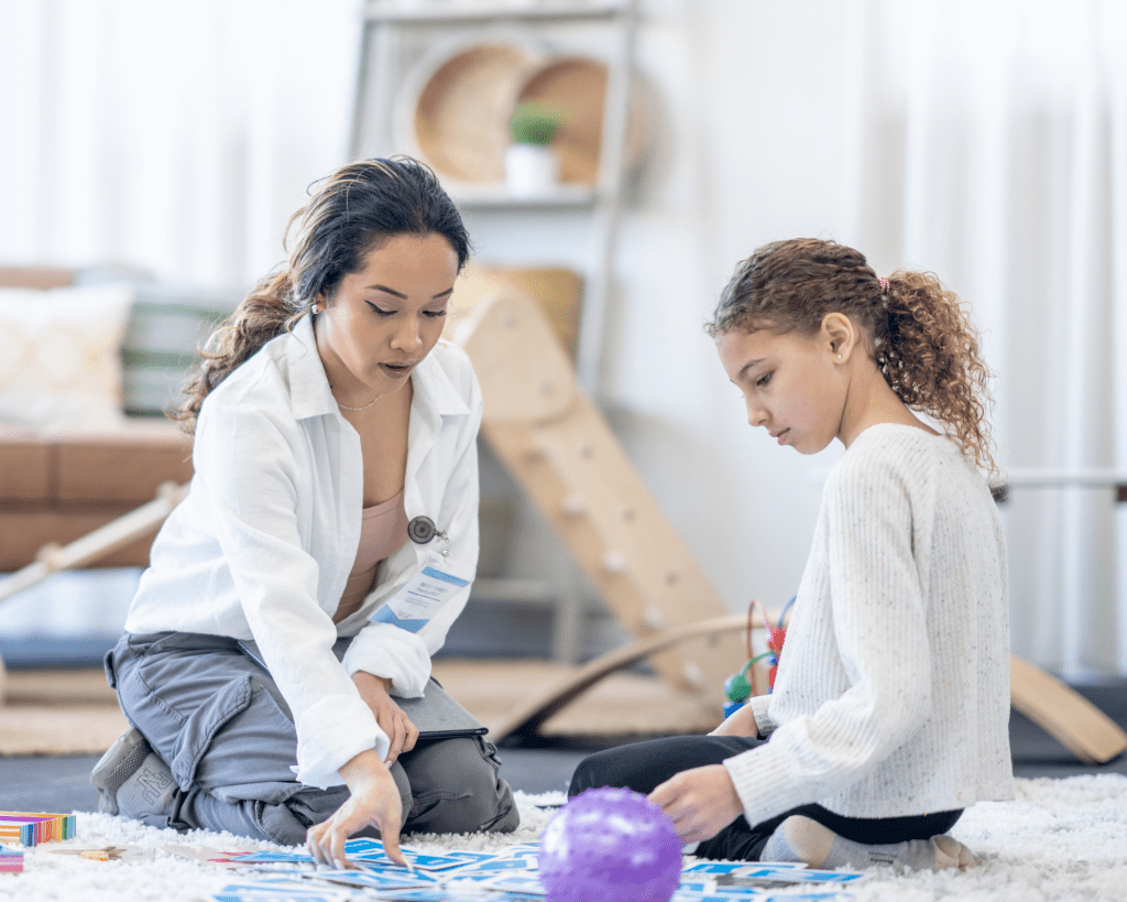 Untitled-design-74 - The Autism Therapy Group - ABA Therapy therapist using aba therapy techniques with a client