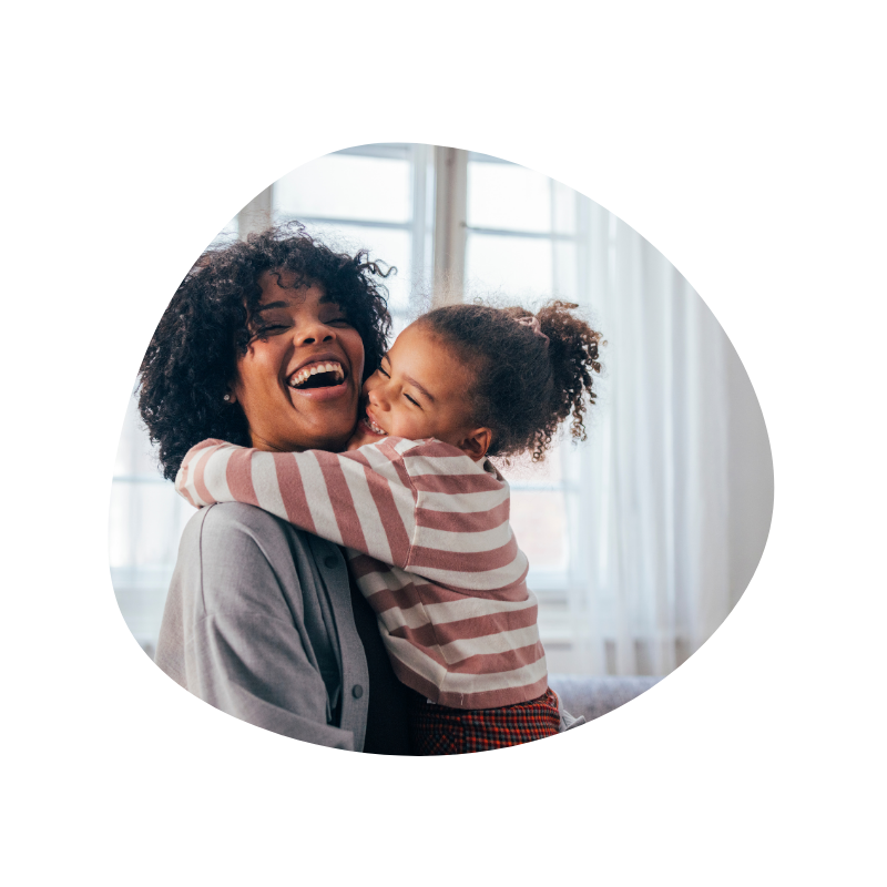 mother hugging daughter