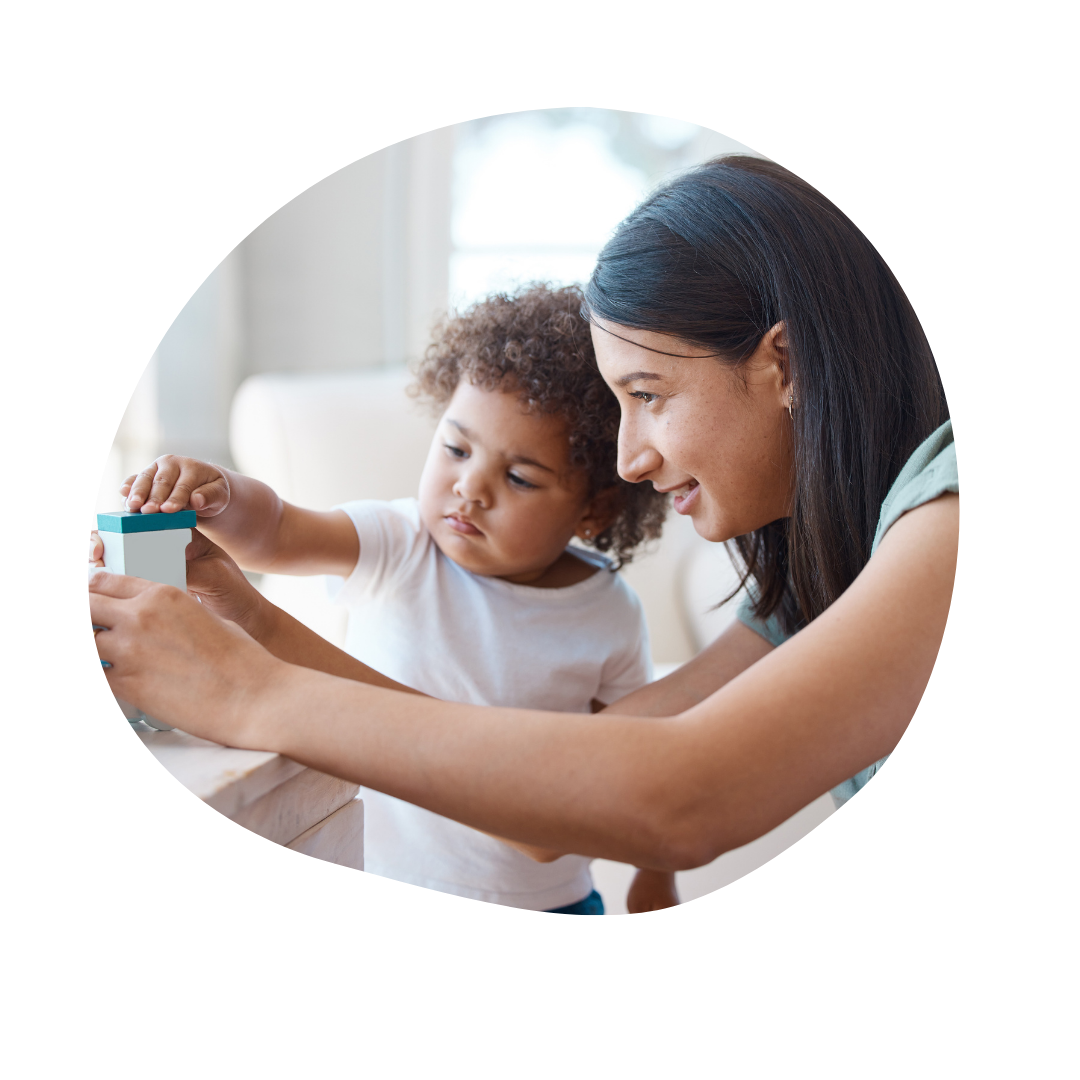 Parent with child at-home ABA therapy