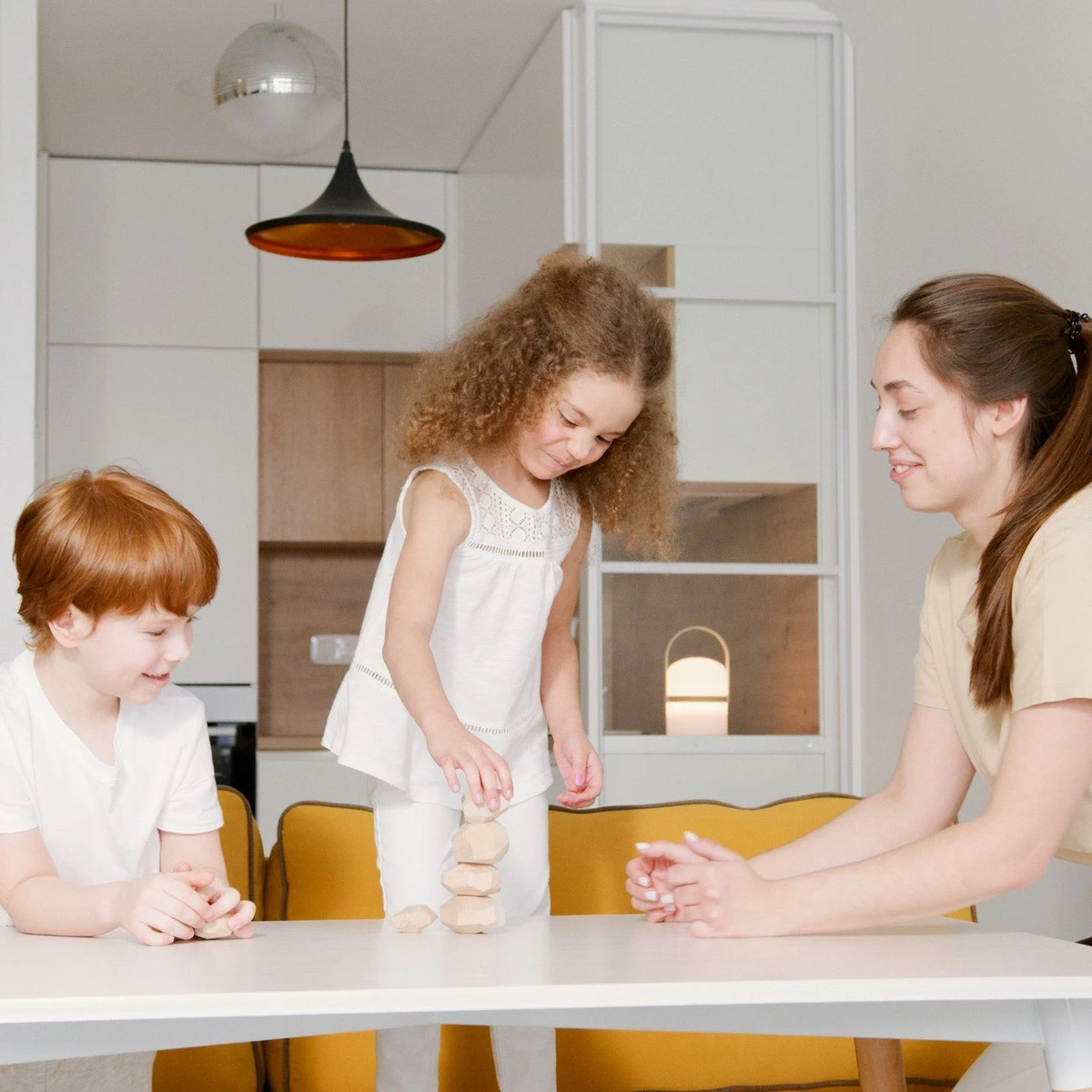 Child practicing a learning activity with ABA therapy support for family-focused ABA therapy in Kane County, IL